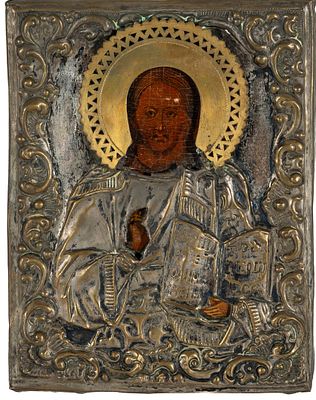 A Russian icon “Christ,” painted in tempera on panel with embossed silver sheet, 19th century 