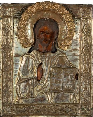 A Russian icon “Pantocrator,” tempera on panel and embossed metal, 19th century 18 x 14 cm 200 