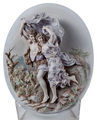 A French polychrome biscuit oval "Couple in a landscape", 19th century 33 cm 125 - 200 €