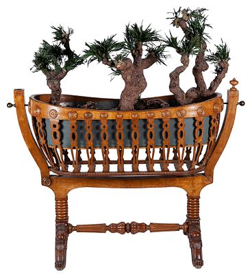 Cuna de madera calada, S.XIX. A carved and pierced mahogany wood cradle, 19th century Converted 