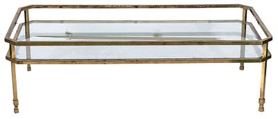 Mesa de centro de lat&oacute;n dorado. A gilt-brass coffee table. Missing glass 42 x 70 x 142 cm 150 - 200 €