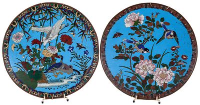 A pair of 19th Century Japanese enamel on copper plates with bird decoration on a blue 