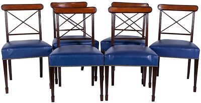 A set of six blue leather and wood English mahogany dining chairs with pierced X-shaped backs 