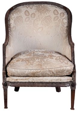 A Louis XVI style carved walnut "berg&egrave;re", late 18th Century and 19th Century. The front 