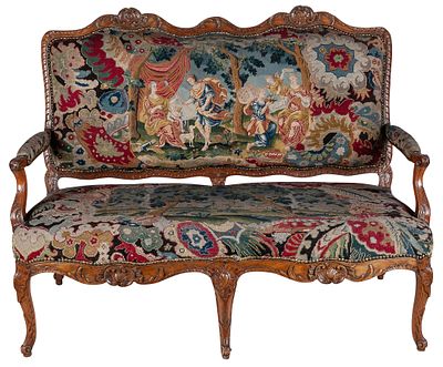 A French Regency gros and petit-point-upholstered carved wood canape with "&agrave; la reine" 