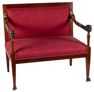 A Ferdinand VII of Spain mahogany bench with carved, gilt and polychrome arms in the shape of 