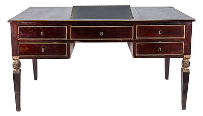 A Ferdinand VII of Spain mahogany desk with stipe legs with carved and gilt upper part and a 