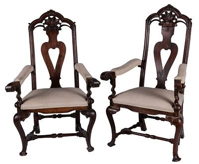 A pair of Philip V period Spanish openwork-backrest and curved leg walnut armchairs, 18th 