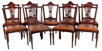 Nine Spanish Ferdinand style mahogany chairs with openwork backrests, early 19th Century. 94 x 