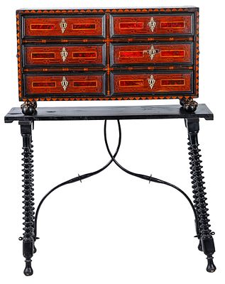 A Spanish bronze-mounted ebonized-wood carved walnut "Vargueno". Charles II of Spain period 