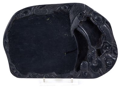 A Chinese stone-inkstone for calligraphy with relief decoration of dragon and clouds 67 cm 80 - 