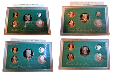 United States - 4 official mint sets of 5 PROOF coins, including display cases. All coins bear 