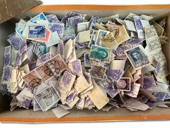 Lot of thousands of world stamps in bulk from all periods - in a cardboard box, not tested 