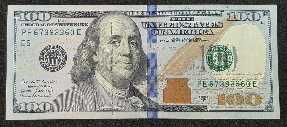 ארצות הברית - שטר 100 דולר 2017 עם טעות דפוס - זליגת צבע (Ink Smear / Ink Transfer Error) על 