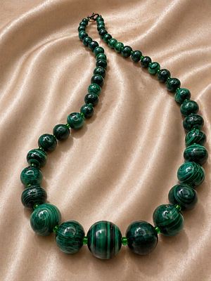 Malachite Bead Necklace, Graduated Green Banded Stones. A striking necklace composed of 
