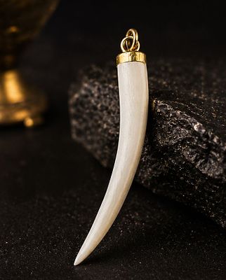 Elegant tusk-shaped pendant crafted from a fine organic material, featuring a smooth polished 