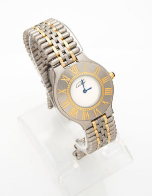 שעון אישה קרטייה 21C מפלדת אל-חלד וזהב 18 קראט. מנגנון: קוורץ 
מבנה הגוף והרצועה: פלדה\זהב 