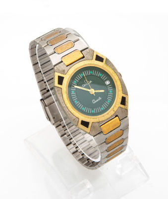 שעון אומגה וינטג' מפלדת אל-חלד. מנגון: קוורץ 
רצוע וגוף השעון: פלדת אל-חלד מוזהבת חלקית 
לוח: 