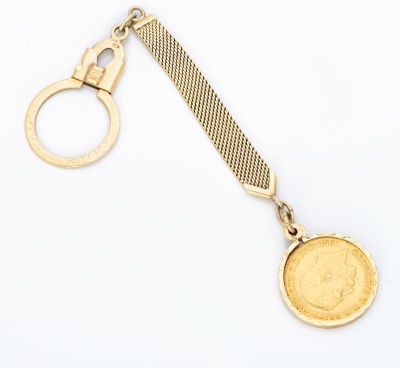 סיכת עניבה מזהב 18-14 קראט עם סוברן אדוארד השביעי, 1909, אוסטרליה. סוברן משובץ בחישוק זהב ומעליו 