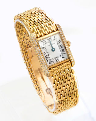 שעון יד לאישה קרטייה טנק Cartier Tank מזהב צהוב ויהלומים. מידת השעון: 25 מ"מ 
משובת יהלומי 