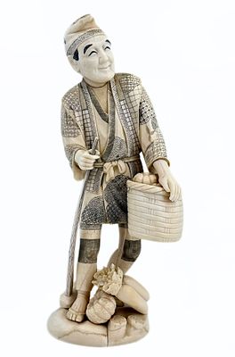 Okimono figurine made of organic material, in the form of a farmer, Japan, late 19th century 