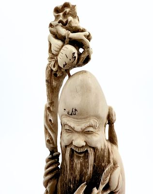 Okimono Figurine, Made of Organic Material, Depicting a wise elder with young boy, Japan, Late 