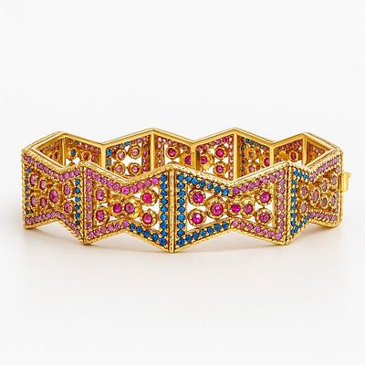 18K Gold Bracelet. Designed as diamond-shaped links set with stones in pink and blue tones.
18K