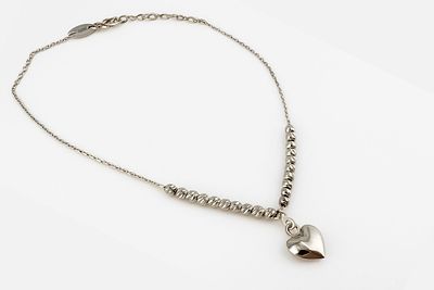 14K White Gold Anklet
. Beads and heart-shaped pendant
14K white gold
Closed bracelet length