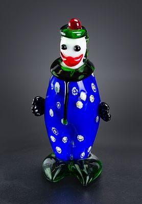 VINTAGE MURANO GLASS CLOWN IN BLUE FIGURINE. Height: cm
Width: cm
Provenance: Collection of