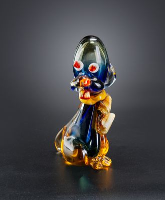 VINTAGE MURANO GLASS CLOWN DOG FIGURINE. Height: cm
Width: cm
Provenance: Collection of Yafit