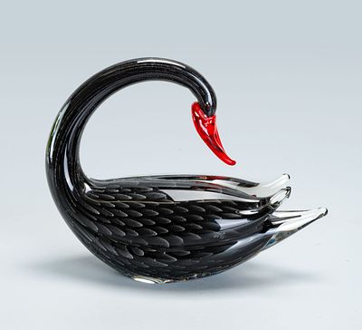 A vintage Murano glass figurine, handmade in the shape of a black swan. Height:17 cm
Width:22