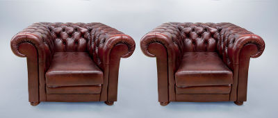 A Pair of Chesterfield Leather Armchairs. Dimensions Height 74 cm, width: 105 cm, depth: 90 