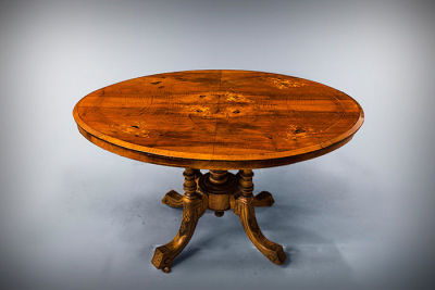 An Oval Marquetry Breakfast Table, 19th Century. Dimensions Height: 69 cm; width: 116 cm; 