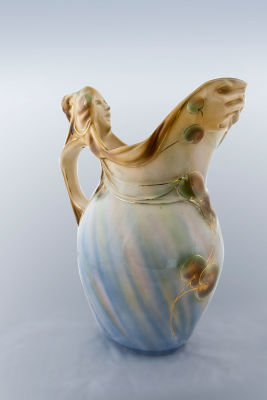 An Art Nouveau "Mehlem" Ceramic Maiden Pitcher, Germany, Circa 1900. Dimensions Height: 34 