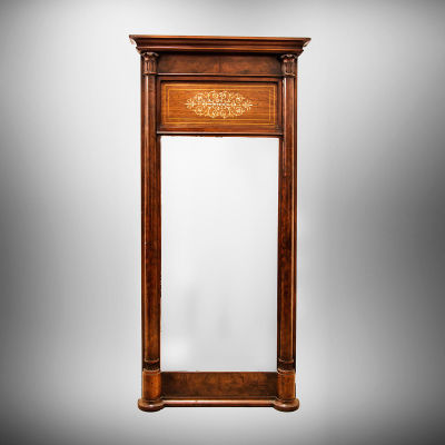 An Empire Mahogany Mirror, Sweden, 1840-1860. Dimensions Height: 145 cm; width: 62 cm 
