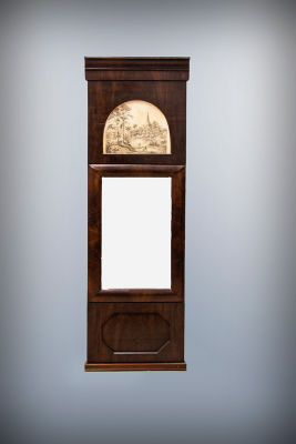 An Empire Mahogany Veneer Mirror, Sweden, 1840-1860. Dimensions Height: 119 cm, width: 39 cm 