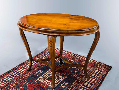 A Jugendstil Oval Table, Early 20th Century. Dimensions Height: 76 cm, width: 93 cm, depth: 