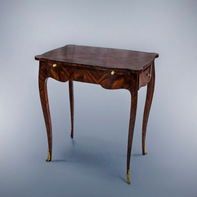 An Antique French Exotic Wood Side Table. Dimensions Height: 74 cm; width: 67.5 cm; depth: 45 