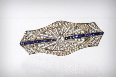 An 18K Gold, Diamond, Sapphire and Pearl Art Deco Brooch. Provenance Estate of Mrs. Rosa 