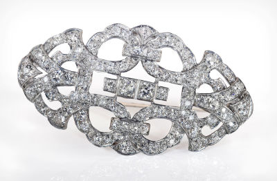 A Late Art Deco Diamond Brooch. Dimensions Total weight: 22 gr Provenance Estate of Elena 