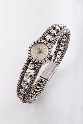A Fine Diamond and 18K White Gold Lady's Wristwatch by Saldory, Switzerland. Dimensions Total 