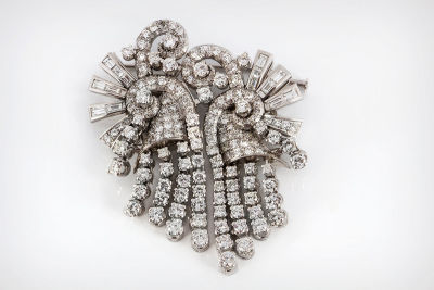 A Diamond and Platinum Double Clip Brooch, 1940's. Dimensions Total diamond weight: over 7 