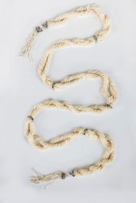 A Magnificent Art Deco Diamond, Emerald and Seed Pearl Longchain, Circa 1900. Dimensions 