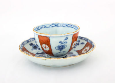 An Fine Small Chinese Porcelain Cup and Saucer with Blue, Gold and Red Decoration, 18th Century. 