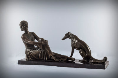 After Armand Godard, A Bronze Sculpture of a Seated Woman and Greyhound, France, c. 1930. <span 
