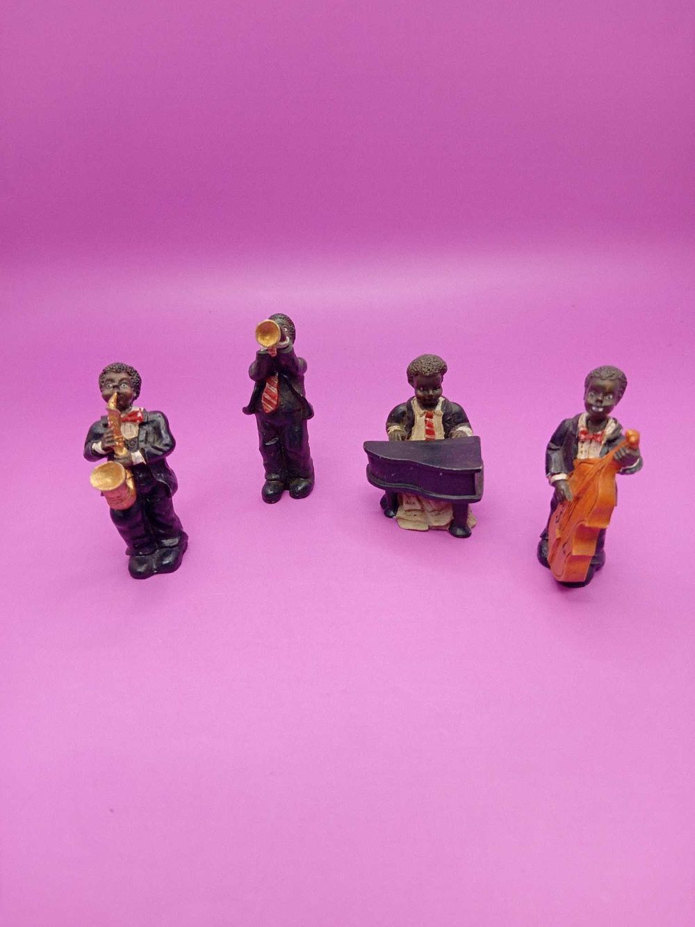 Lot 315: Vintage four piece jazz band musician figures