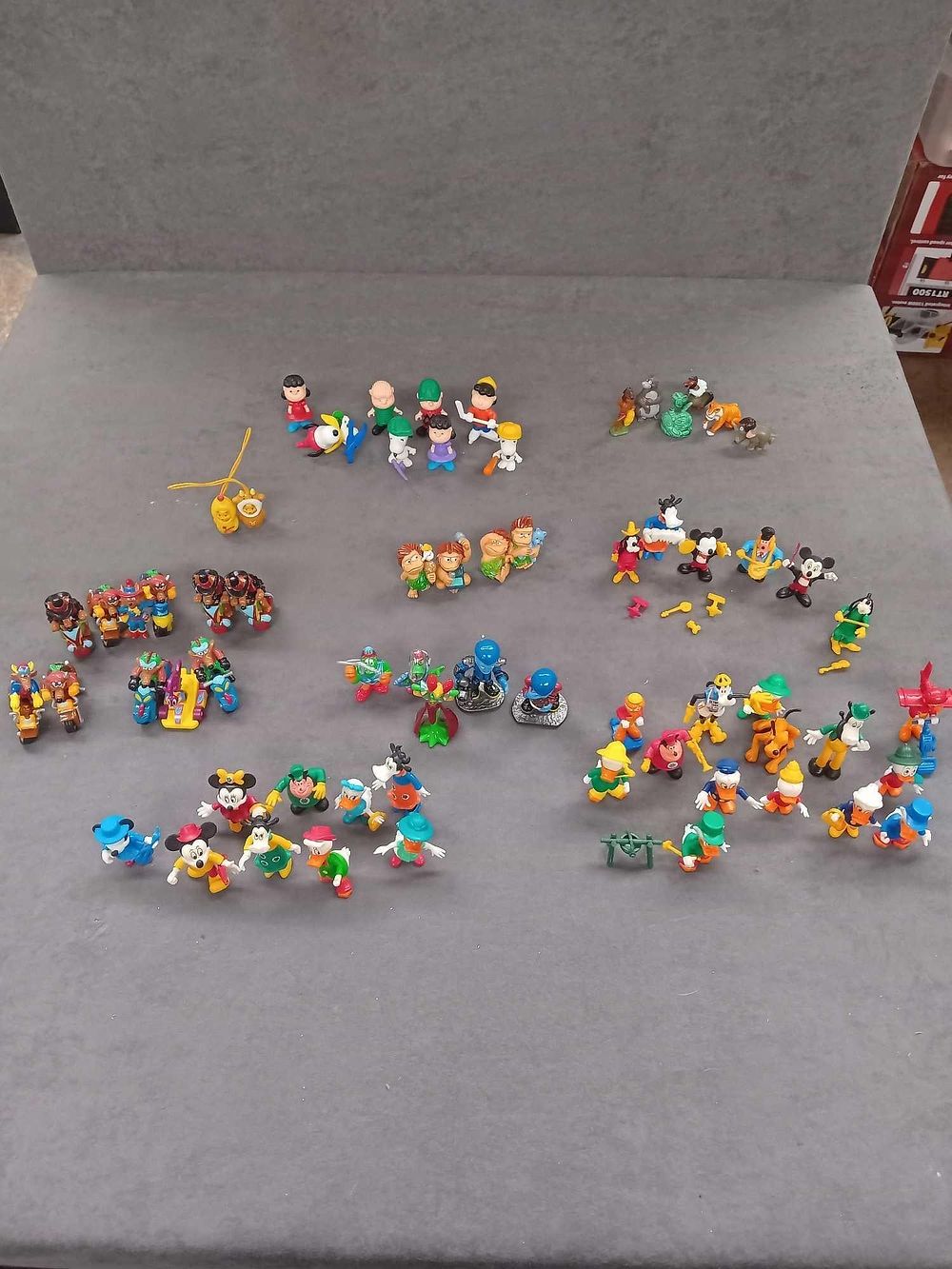 Lot 334: Mixed lot of vintage Kinder toys including Mickey...