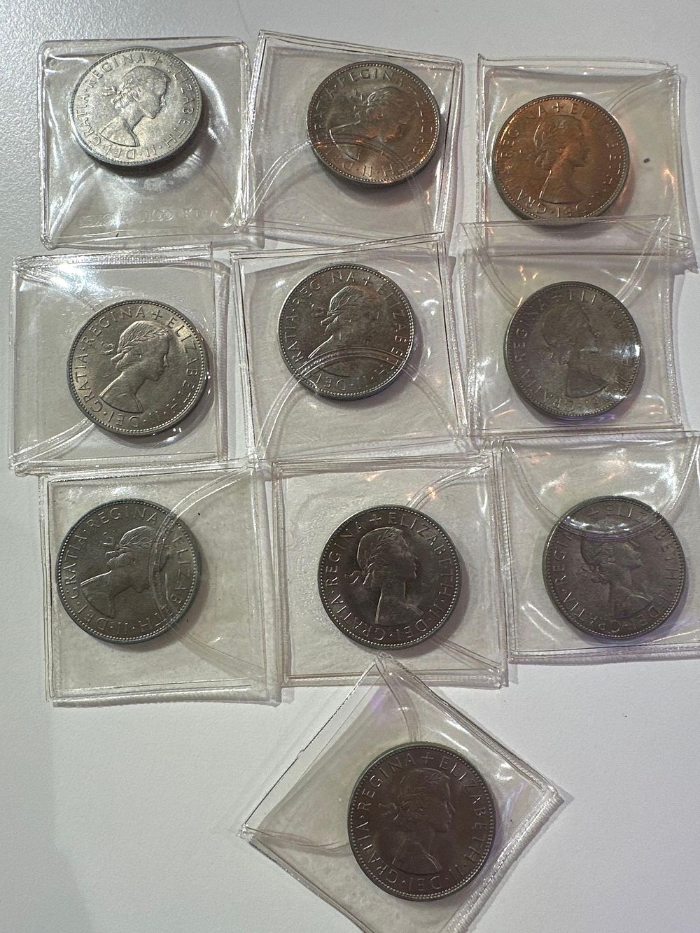 Lot 672: 10 x 1966 UNC Half Crown in plastic...