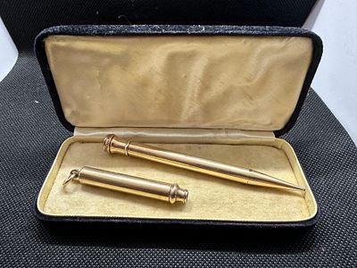 A Pair of Gold Plated Pencils. ones dated 1897 other made in USA.