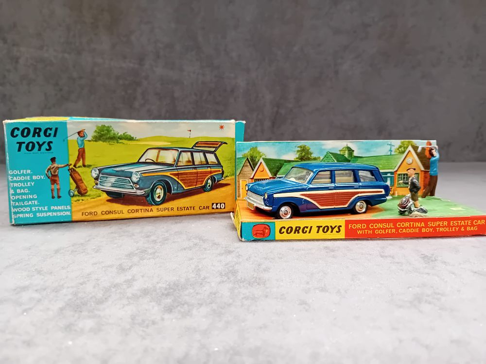 Lot 257: Corgi Toys #440 Ford Consul Cortina Super Estate Car. Golfer, Caddie Boy and Golf bag included. Model and box all in good condition. box has some slight crushing but all in tact.